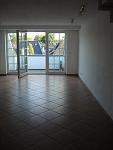 Das Wohnzimmer von dem Flur aus